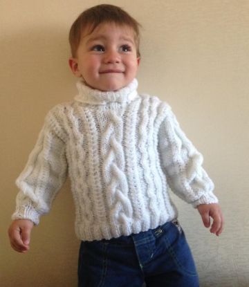 Maglione con trecce
